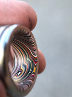 Fordite and titanium Black Badger ring